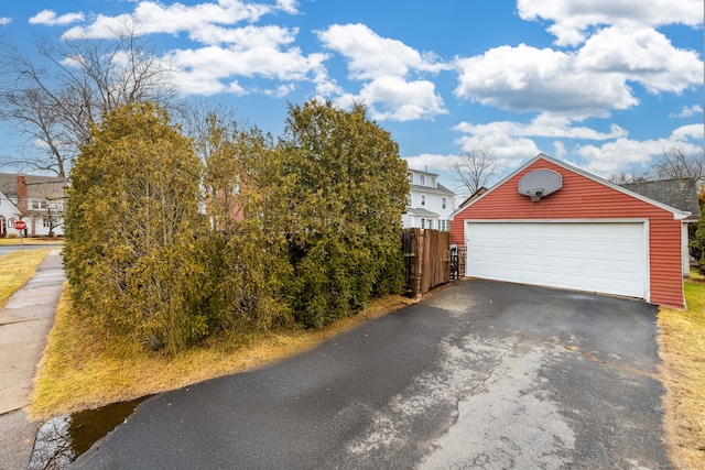 detached garage with fence