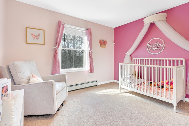 bedroom with a nursery area, baseboards, carpet floors, and a baseboard radiator