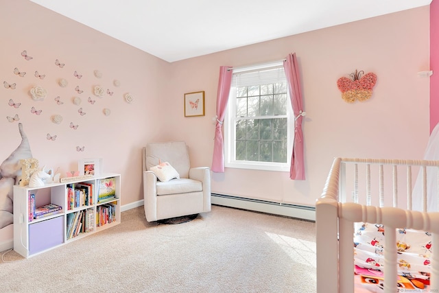 carpeted bedroom featuring a baseboard heating unit