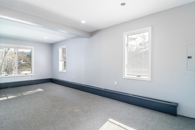 carpeted spare room with beam ceiling, electric panel, recessed lighting, a baseboard radiator, and baseboards