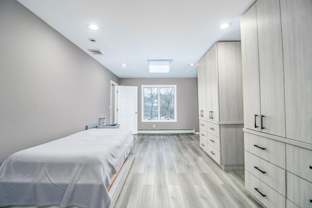 bedroom featuring a baseboard radiator, recessed lighting, visible vents, and light wood-type flooring