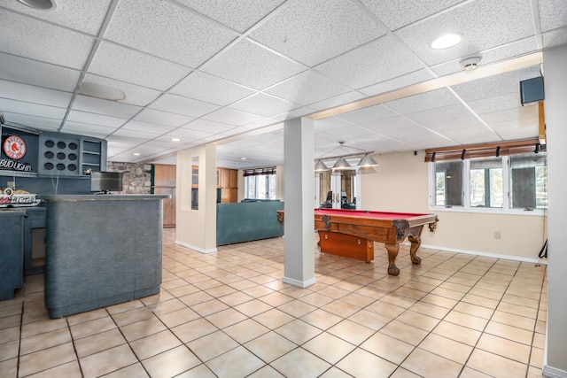 playroom with light tile patterned floors, baseboards, a paneled ceiling, and pool table