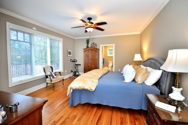 bedroom with light wood-style flooring, ensuite bathroom, crown molding, baseboards, and ceiling fan