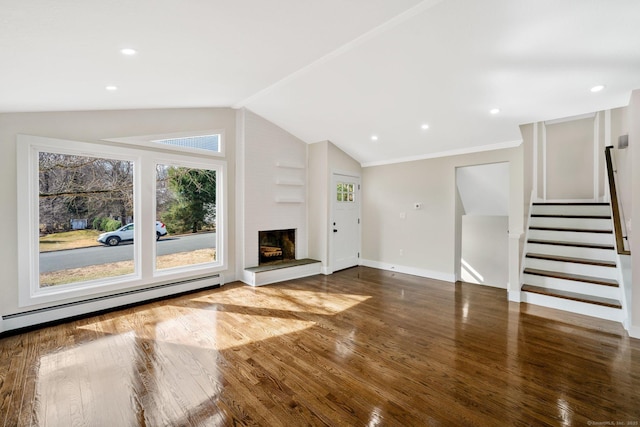 unfurnished living room featuring wood finished floors, a baseboard radiator, a fireplace, stairs, and vaulted ceiling