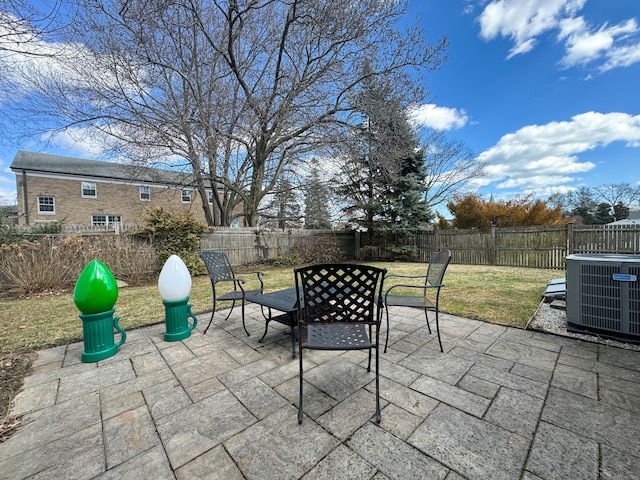 view of patio featuring a fenced backyard and central AC