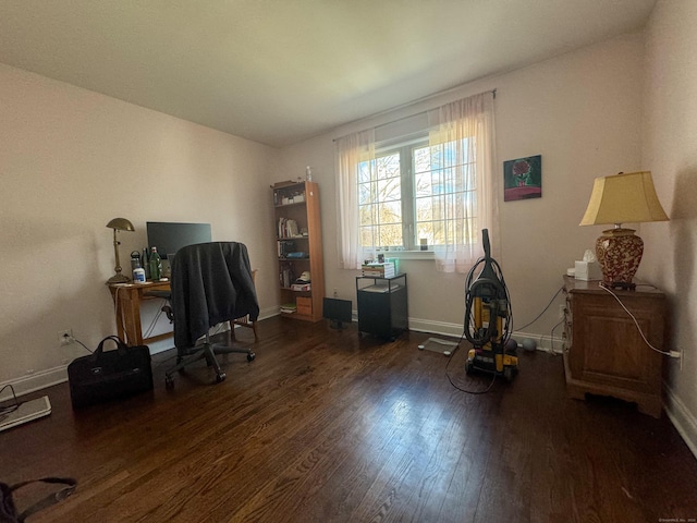 office area with baseboards and wood finished floors