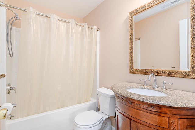 bathroom with visible vents, shower / tub combo with curtain, vanity, and toilet