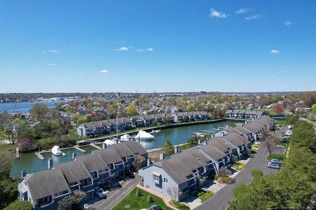 aerial view with a residential view and a water view