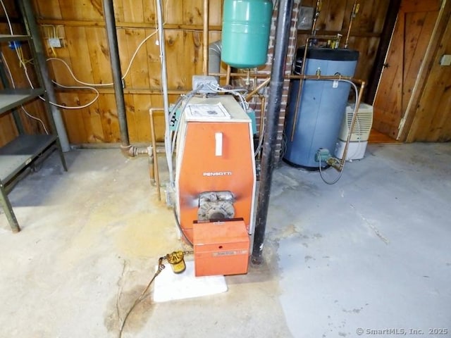 utility room with a heating unit and water heater