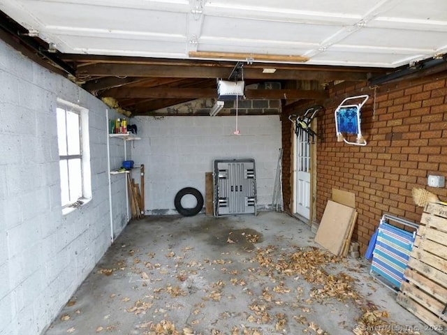 garage featuring a garage door opener