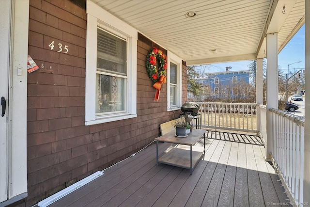 wooden deck featuring a porch