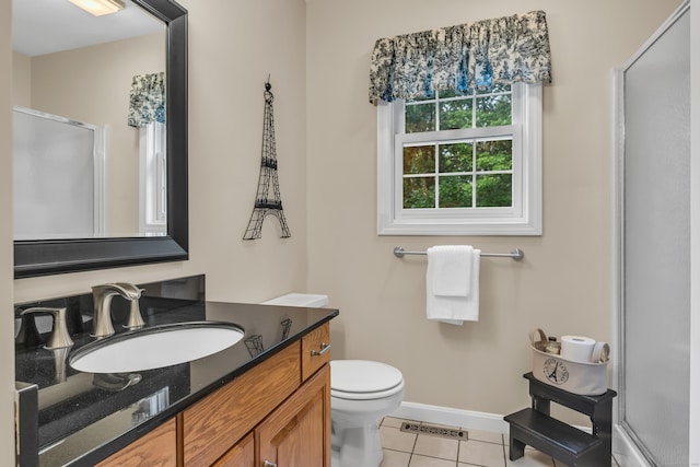 full bath with tile patterned floors, visible vents, a stall shower, and vanity