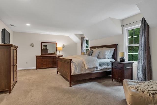 bedroom with visible vents, light carpet, recessed lighting, baseboards, and vaulted ceiling