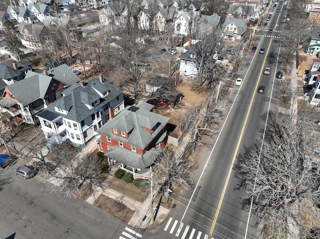 birds eye view of property with a residential view