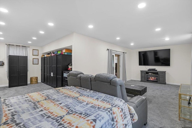 interior space with recessed lighting, baseboards, and a fireplace