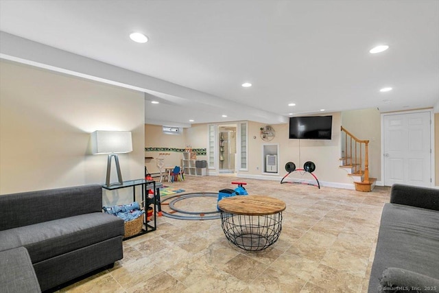 living area featuring recessed lighting, stairway, and baseboards