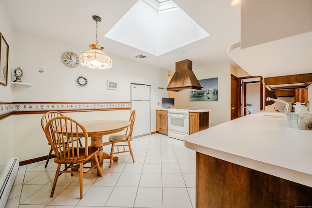 kitchen featuring baseboard heating, a skylight, island range hood, white appliances, and a sink