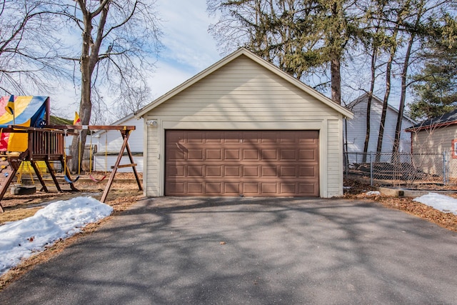 detached garage with fence