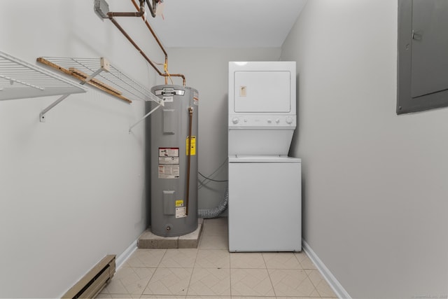 laundry area featuring baseboards, stacked washing maching and dryer, laundry area, electric panel, and water heater