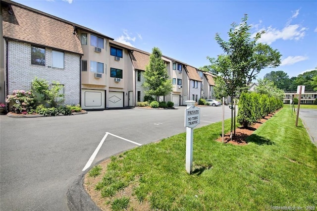 view of road with a residential view