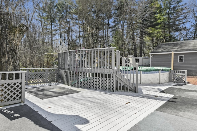 deck with a covered pool