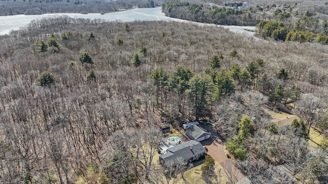 aerial view featuring a wooded view