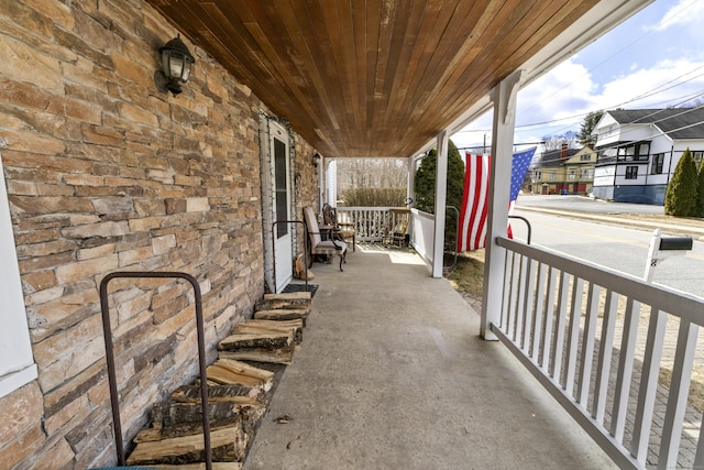 view of patio featuring a porch