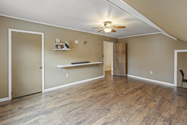 unfurnished living room with baseboards, crown molding, a ceiling fan, and wood finished floors