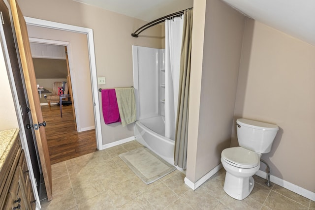 full bath featuring tile patterned flooring, shower / tub combo, toilet, and baseboards