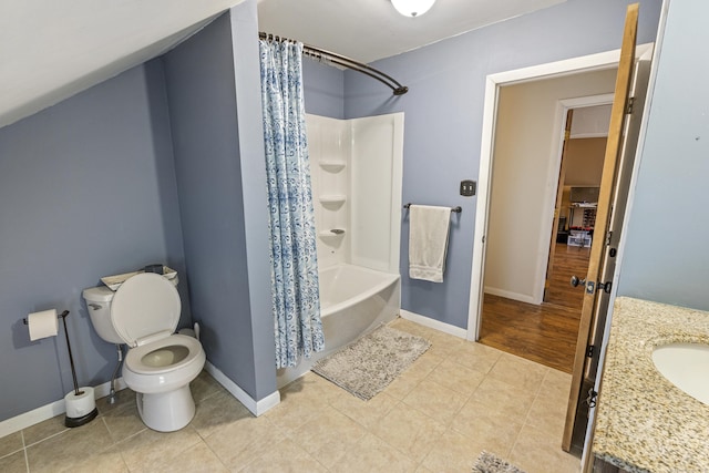 full bathroom with tile patterned floors, toilet, baseboards, and shower / bathtub combination with curtain