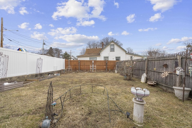 view of yard featuring a fenced backyard