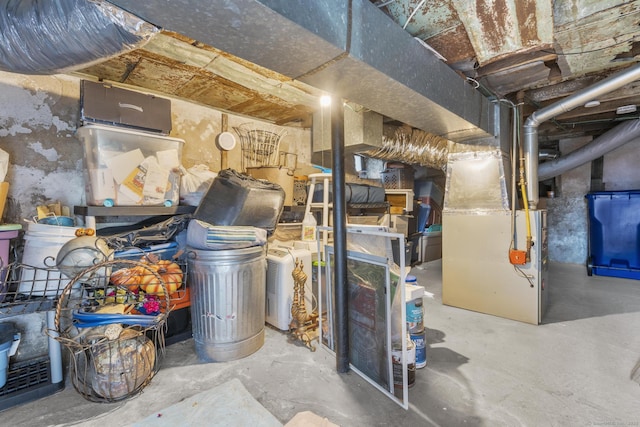 unfinished basement with heating unit