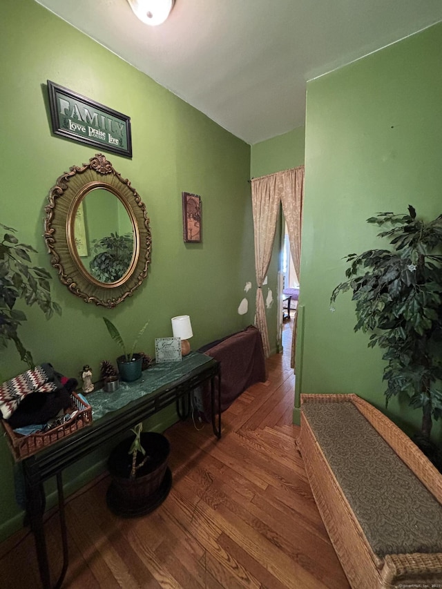 hallway with wood finished floors