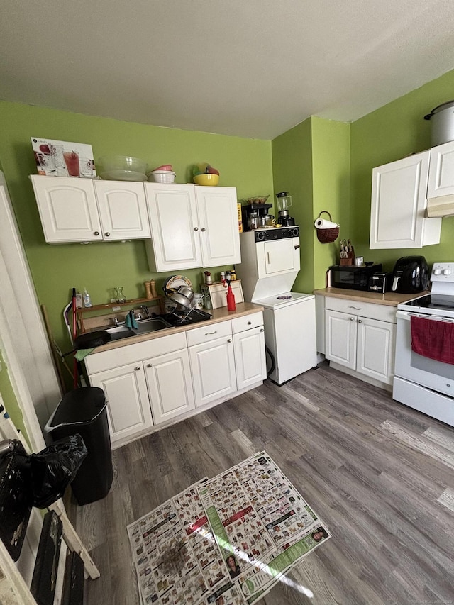 kitchen with white cabinetry, dark wood-style floors, light countertops, and white range with electric cooktop