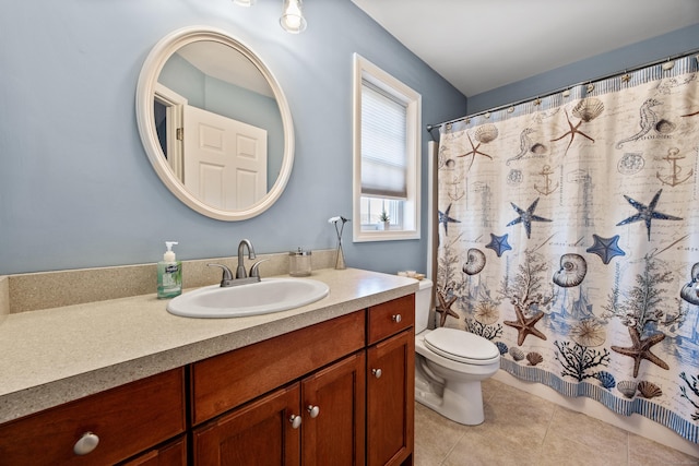 full bathroom featuring tile patterned floors, toilet, vanity, and a shower with curtain