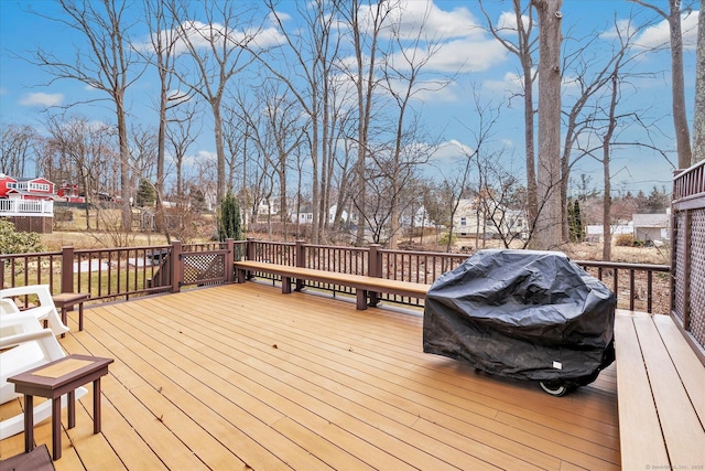 wooden deck featuring grilling area