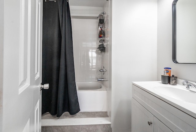 bathroom with tile patterned flooring, vanity, and shower / bathtub combination with curtain