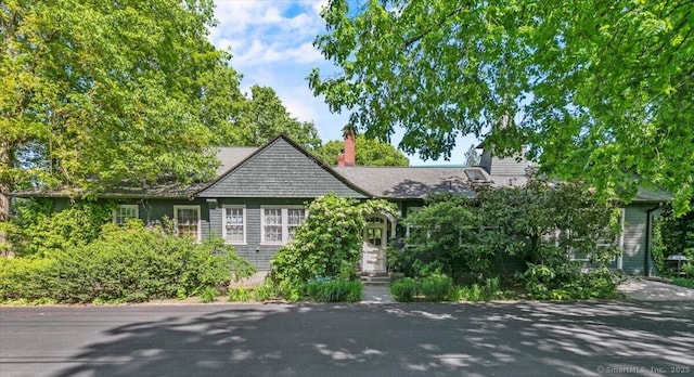 view of front of home with a chimney