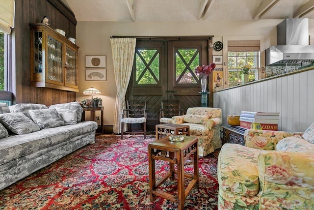 sitting room with beamed ceiling