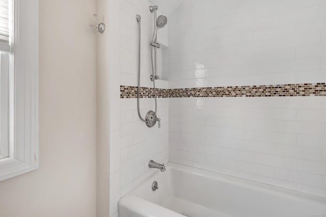 bathroom with shower / bath combination