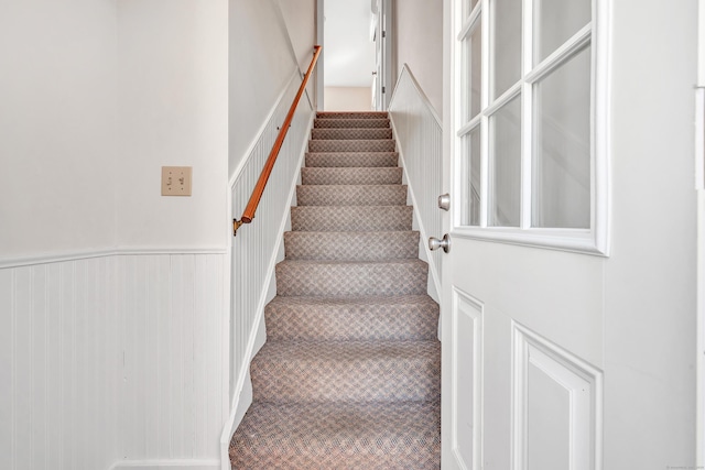 staircase with wainscoting