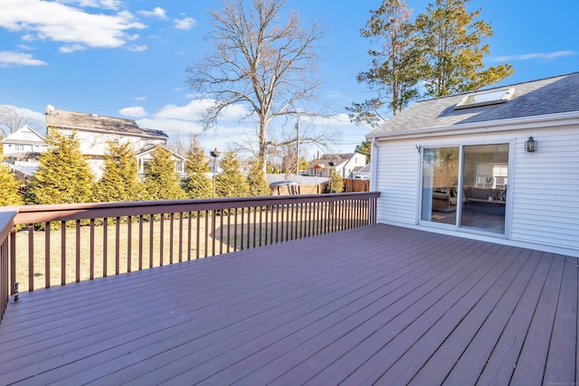 wooden deck featuring a residential view