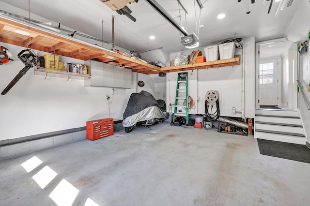 garage featuring a garage door opener