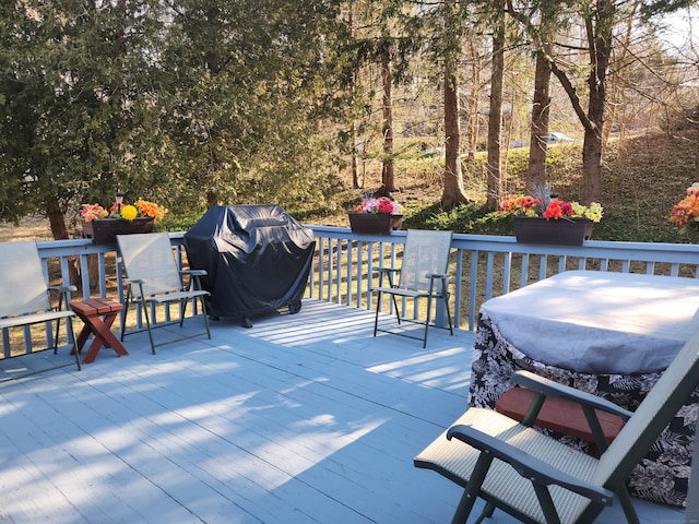 wooden terrace with grilling area