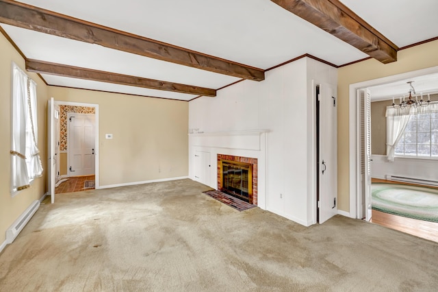 unfurnished living room featuring beam ceiling, a brick fireplace, carpet, and a baseboard radiator