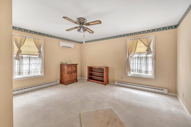 carpeted spare room with a wealth of natural light, a baseboard radiator, and an AC wall unit