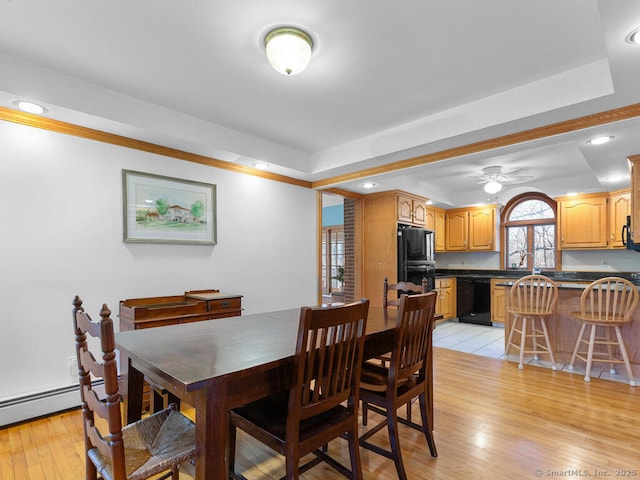 dining area with light wood finished floors, recessed lighting, and ceiling fan