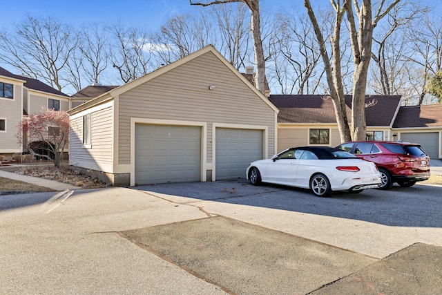 view of front of house featuring driveway and a garage