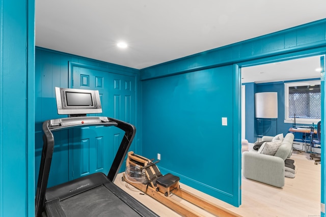 exercise area with wood finished floors