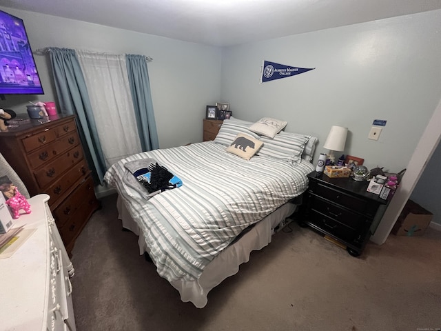 bedroom featuring carpet